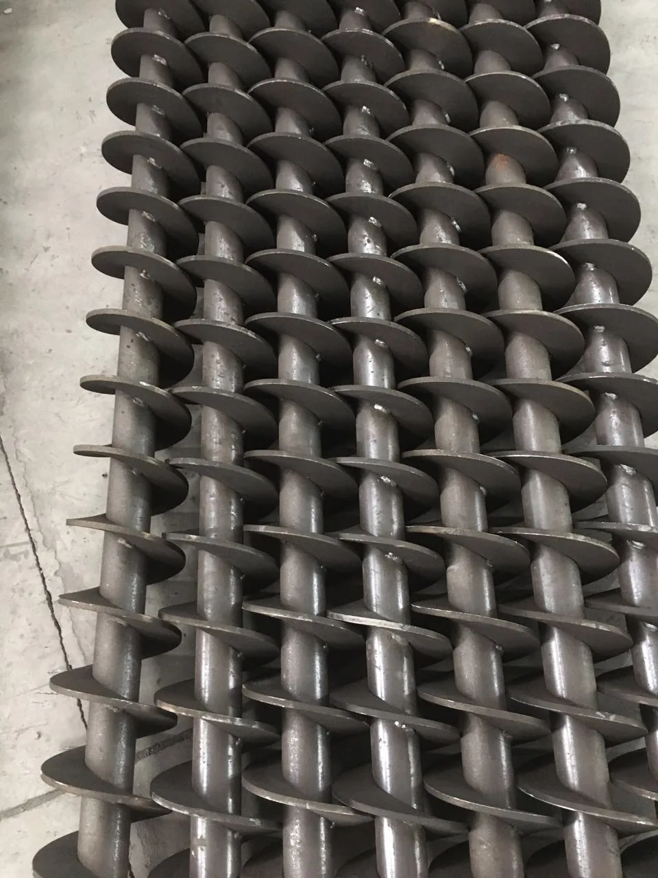 Multiple shafted auger screw assemblies for a production order Multiple shafted auger screw assemblies for a production order